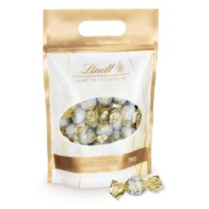 Lindt Marc De Champagne, 56 de ciocolate cu lapte integral, cu umpluturi rafinate, care conțin alcool, 70 grame Bomboane de Ciocolata Naty Shop
