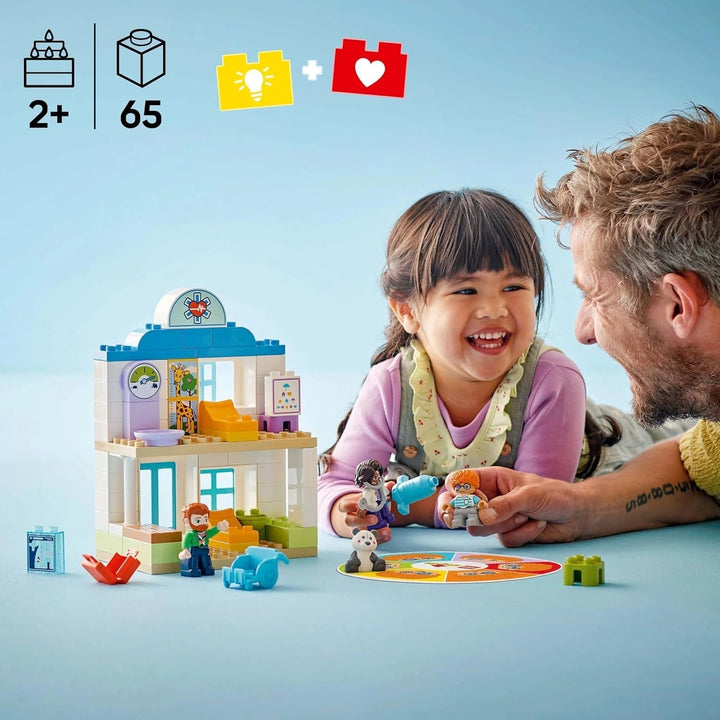 LEGO DUPLO Town Prima vizită la doctor, jucărie de construcție, set de joacă pentru a promova abilitățile motorii fine, cadou pentru copiii mici de la 2 ani, jucărie educativă, joc de rol în spital 10449 Seturi de constructie Besuche den LEGO-Store