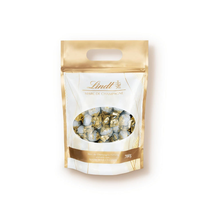 Lindt Marc De Champagne, 56 de ciocolate cu lapte integral, cu umpluturi rafinate, care conțin alcool, 70 grame Bomboane de Ciocolata Naty Shop