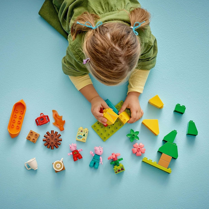 LEGO DUPLO Peppa Wutz Camping Trip - jucărie educativă pentru băieți și fete de la 2 ani - include cort, canoe, foc de tabără și 2 minifigurine - jucărie pentru activități motorii, sortare după culoare 10452 Seturi de constructie Besuche den LEGO-Store