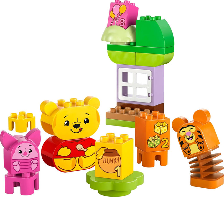 LEGO DUPLO - Disney Winnie the Pooh's Birthday Party - jucărie educativă pentru preșcolari - set cu 3 minifigurine, inclusiv Winnie the Pooh, Tigger și Piglet - idee de cadou pentru băieți și fete de la 1,5 ani 10457 Seturi de constructie Besuche den LEGO-Store